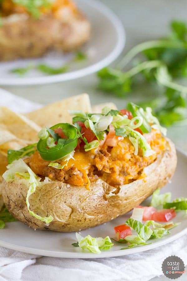 Break away from your normal Taco Tuesday with these Taco Stuffed Potatoes - twice baked potatoes with a southwestern twist!