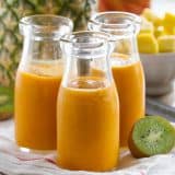 Get some veggies in with this sweet smoothie that tastes like the tropics. This Tropical Carrot Smoothie is sure to be a hit with both the kids and the adults!