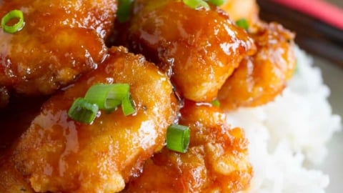 Sweet and sour chicken on top of rice