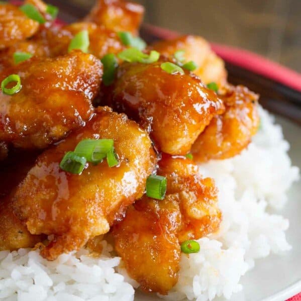 Sweet and sour chicken on top of rice