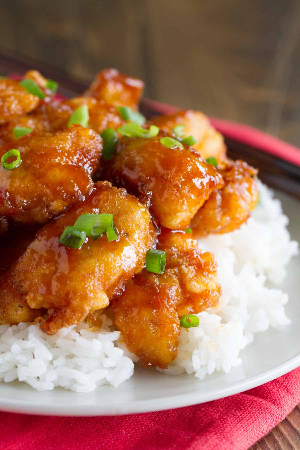 Sweet and sour chicken on top of rice