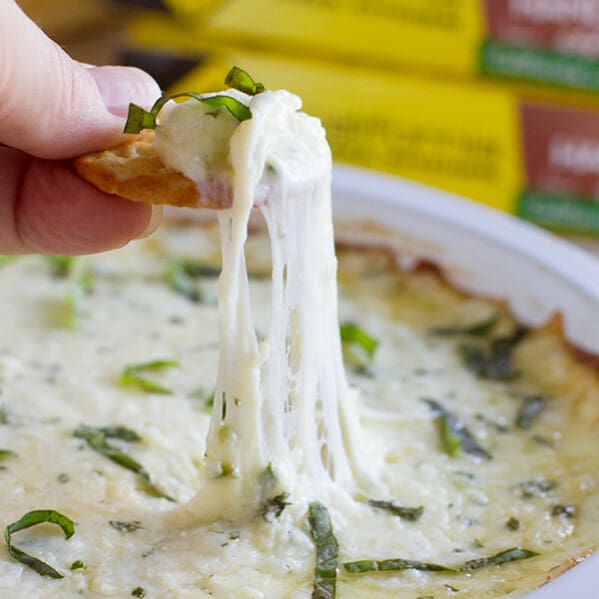 Hot and cheesy and totally addictive - this White Cheese Dip is the perfect addition to any pizza night at home!