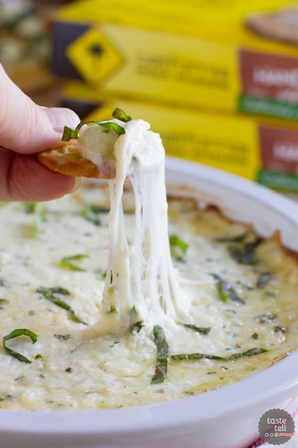 Hot and cheesy and totally addictive - this White Cheese Dip is the perfect addition to any pizza night at home!