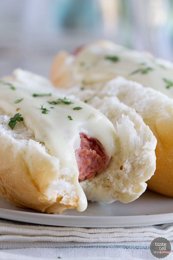 Cordon bleu doesn’t have to mean fancy - these Cordon Bleu dogs have hot dogs wrapped in ham and then topped with a creamy Dijon cheese sauce.