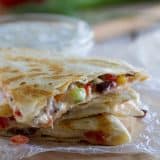 All of your favorite Greek flavors in a cheesy tortilla! These Greek Quesadillas are great for lunch or an easy vegetarian dinner.