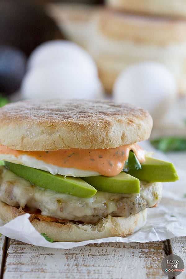 Perfect for breakfast, lunch or dinner, this Sausage and Egg Breakfast Sandwich Recipe has a homemade sausage patty and a perfectly cooked egg, and then is topped with an easy Sriracha Cilantro Mayonnaise.