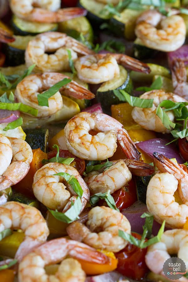 A great way to use up the summer vegetables, this perfect summer dinner is done in a snap with minimal clean up with this Sheet Pan Balsamic Shrimp and Summer Vegetables.