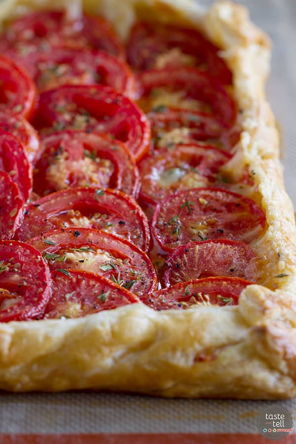 Perfect as a light supper or as a side dish, this Tomato Tart with Bacon and Gruyere is as tasty as it is beautiful!