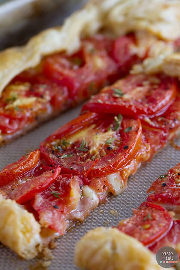 Perfect as a light supper or as a side dish, this Tomato Tart with Bacon and Gruyere is as tasty as it is beautiful!