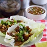 These BBQ Pork Lettuce Cups have pork that is slowly braised in an Asian-inspired bbq sauce, then served on lettuce leaves for a low-carb dinner packed with flavor.