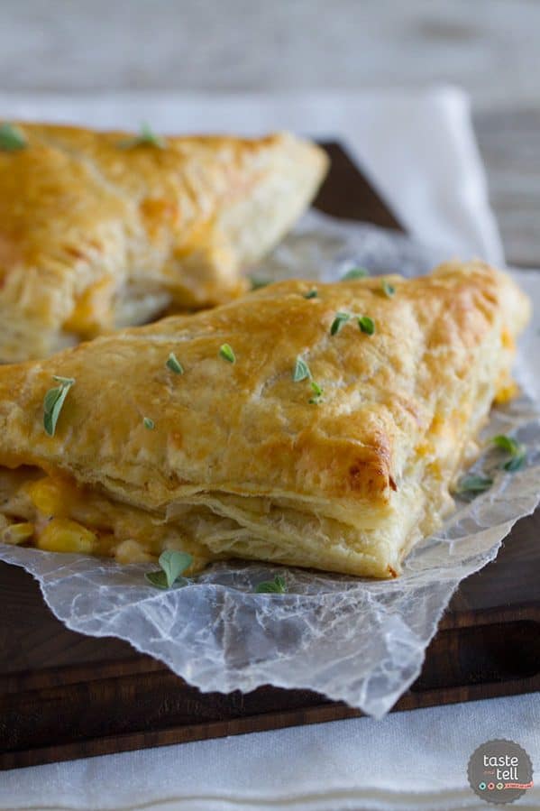 Chicken, corn, cheese and an easy cream sauce are enclosed in puff pastry triangles to make this Creamy Chicken and Corn Turnover Recipe that will be a hit with the family.
