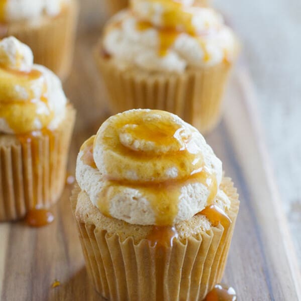 Light as a cloud, these Pumpkin Angel Food Cupcakes are filled with warm pumpkin flavor and topped with a pumpkin spiced whipped cream.