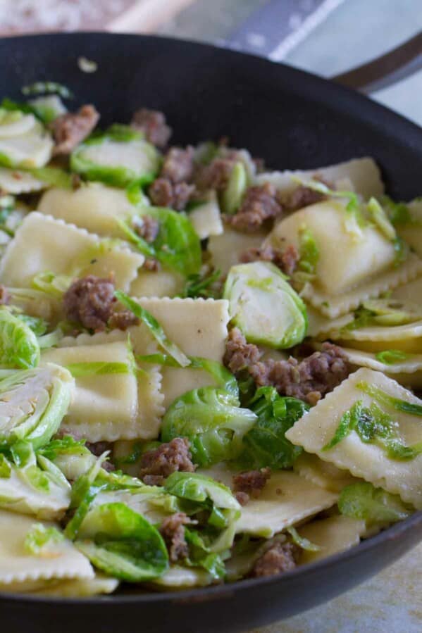 Looking for an easy, fast, dinner with less than 10 ingredient? This Easy Ravioli with Sausage and Brussels Sprouts comes together in well under 30 minutes and is delicious and filling.