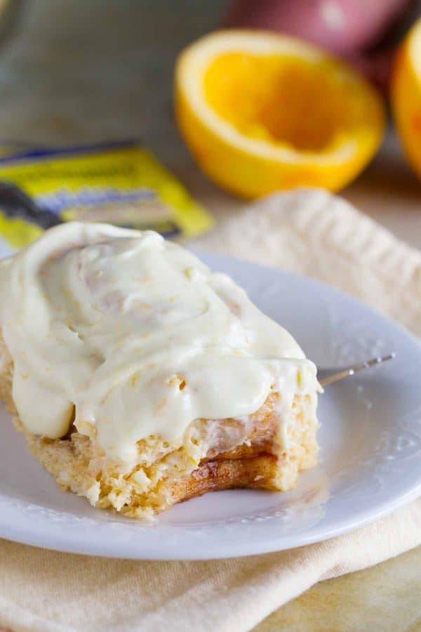 Mashed sweet potatoes make these rolls super tender and soft and the orange cream cheese glaze takes these Sweet Potato Cinnamon Rolls with Orange Cream Cheese Frosting to a new level!