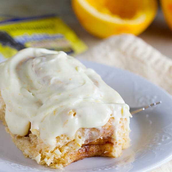 Mashed sweet potatoes make these rolls super tender and soft and the orange cream cheese glaze takes these Sweet Potato Cinnamon Rolls with Orange Icing to a new level!