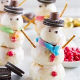 It doesn’t get more fun than these cute snowmen that are a great way to celebrate winter! Rolls are lightly flavored with orange, then stacked into snowmen that get a creamy, orange glaze. A few decorations make these Orange Snowman Rolls a fun, and delicious, activity the whole family will love.