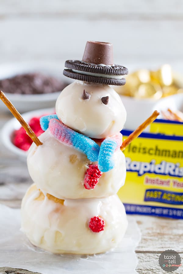 It doesn’t get more fun than these cute snowmen that are a great way to celebrate winter! Rolls are lightly flavored with orange, then stacked into snowmen that get a creamy, orange glaze. A few decorations make these Orange Snowman Rolls a fun, and delicious, activity the whole family will love.