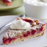 The perfect fall dessert, this Pear and Raspberry Tart takes advantage of ripe, sweet pears and tart raspberries for a beautiful tart that is worthy of company.