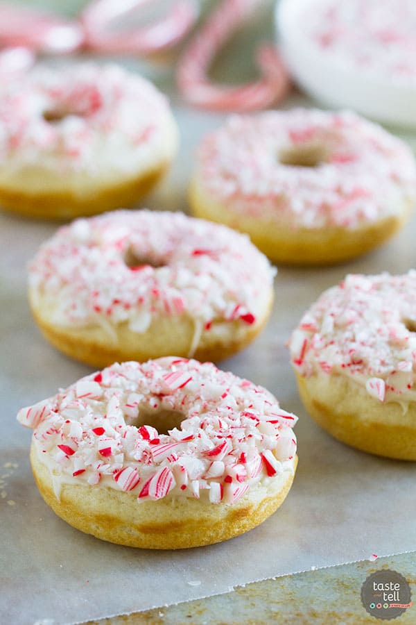 The perfect holiday treat, these Baked Peppermint Donuts are not only topped with crushed candy canes, but the donuts are lightly flavored with peppermint. 