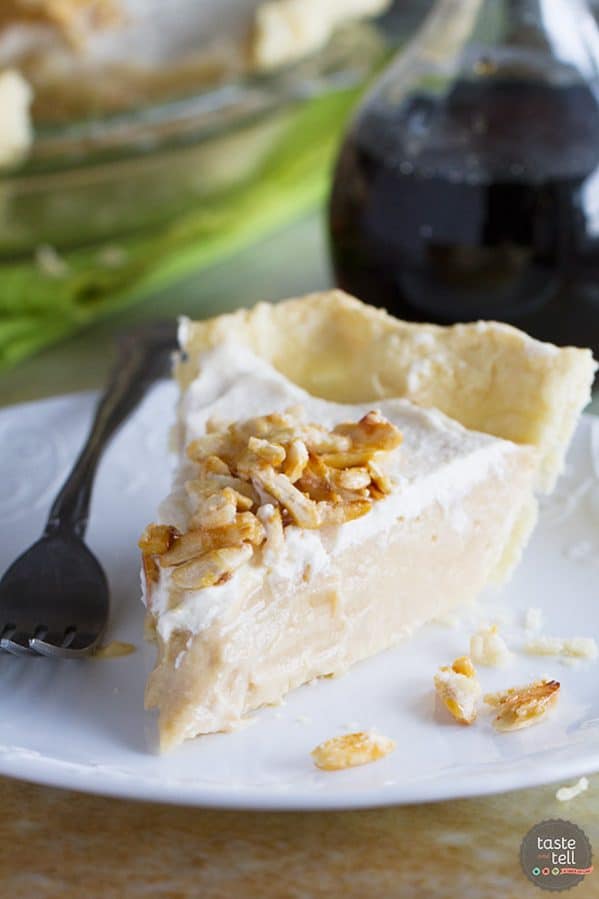 A creamy maple filling is topped with whipped cream and sugared almonds in this Maple Cream Pie Recipe that can easily be made without any refined sugar. It is sweet and silky and simply delicious.