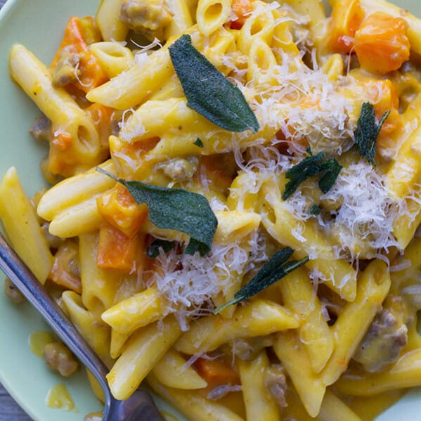 Nothing feels more comforting than this Penne with Butternut Squash and Sausage - with a double dose of butternut squash in both the pasta sauce and then topped with roasted squash.