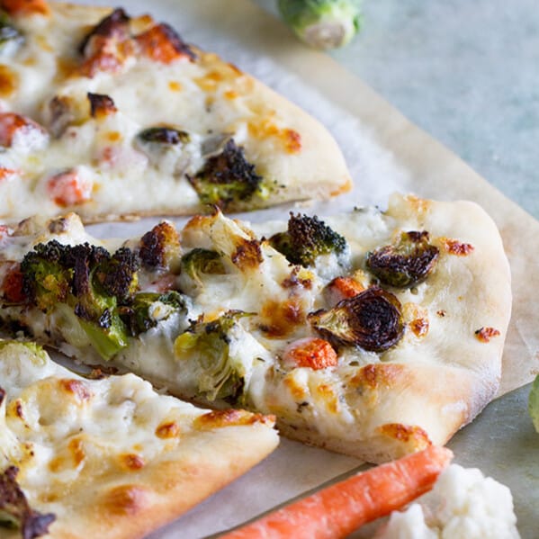 Have a veggie drawer filled with vegetables that are just past their prime? No need to toss them - roast them up for this delicious Roasted Vegetable Pizza with Ranch!