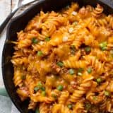 Comfort food in under 30 minutes! This Sloppy Joe Mac n Cheese takes the flavors of a sloppy joe and puts them in a big bowl of comforting pasta. The recipe makes 2 generous servings, but can easily be doubled or tripled to feed a crowd!