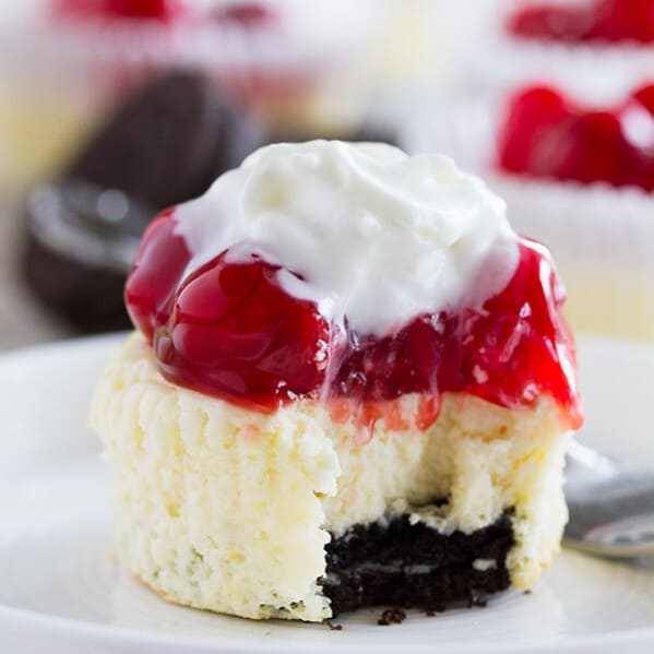 A family favorite since I was a child, these Cherry Cheesecake Tarts have a cookie crust topped with and easy, creamy cheesecake and cherry pie filling. Top the whole thing off with a whoosh of Reddi-wip for the perfect treat!