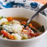 This vegetable minestrone recipe has an addition of gnocchi for a heartier, comforting soup recipe. This Minestrone Recipe with Gnocchi is perfect for any cool night!