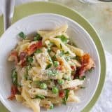 You can’t beat a one pan dinner that is one the table in no time! This One Pan Pasta with Peas and Bacon is easy and flavorful and a pasta dinner that is sure to go on repeat in our house!