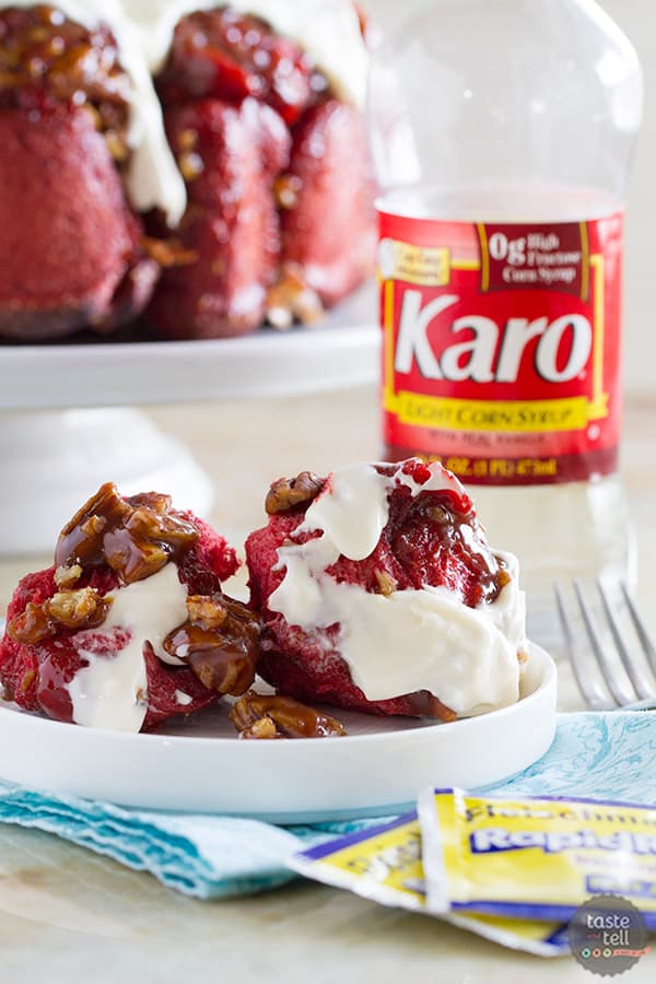 Soft and gooey and a vibrant red, this Red Velvet Pull Apart Bread is perfect for breakfast or for a delicious dessert. Layers of red velvet dough are covered in a gooey cinnamon pecan mixture. Don’t skip the cream cheese icing to top the whole thing off!