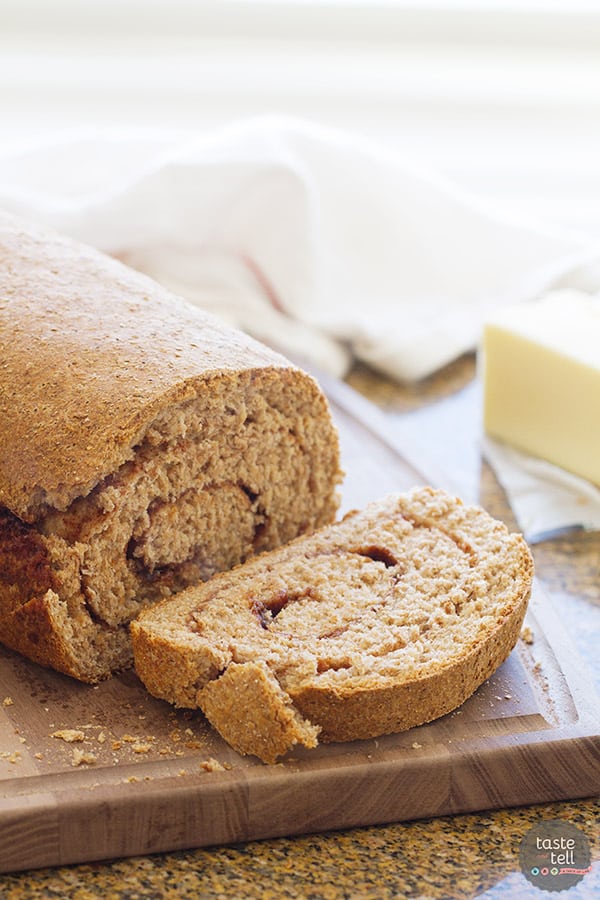 Whole Wheat Cinnamon Swirl Bread with a slice cut.