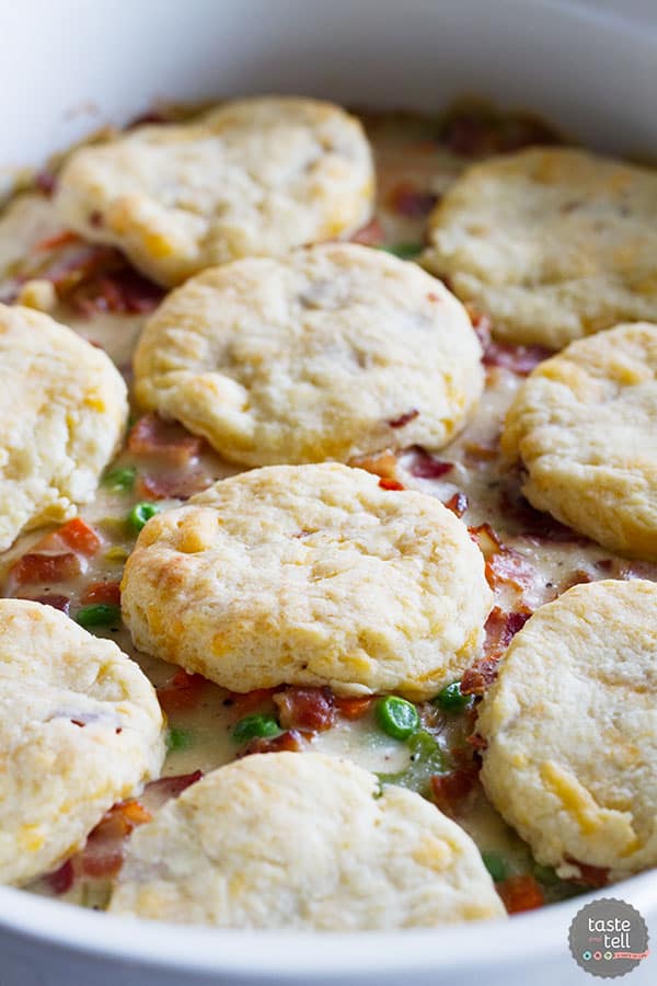 What can be better than a creamy chicken and bacon pot pie, topped with bacon cheddar biscuits? It is said that bacon makes everything better, and this Chicken and Bacon Pot Pie with Bacon Cheddar Biscuits is proof that it is true!