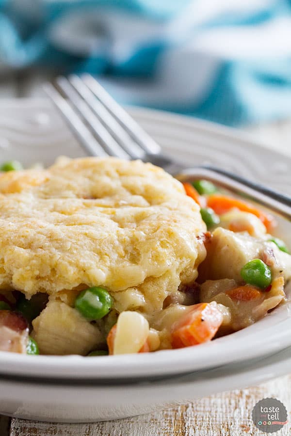 What can be better than a creamy chicken and bacon pot pie, topped with bacon cheddar biscuits? It is said that bacon makes everything better, and this Chicken and Bacon Pot Pie with Bacon Cheddar Biscuits is proof that it is true!
