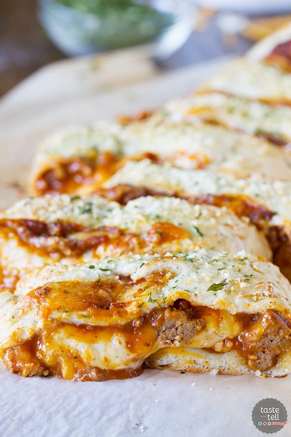 Change up your pizza routine with this Chili Cheese Stromboli! Pizza dough is packed with chili and lots of cheese, then rolled and baked for a fun dinner idea.