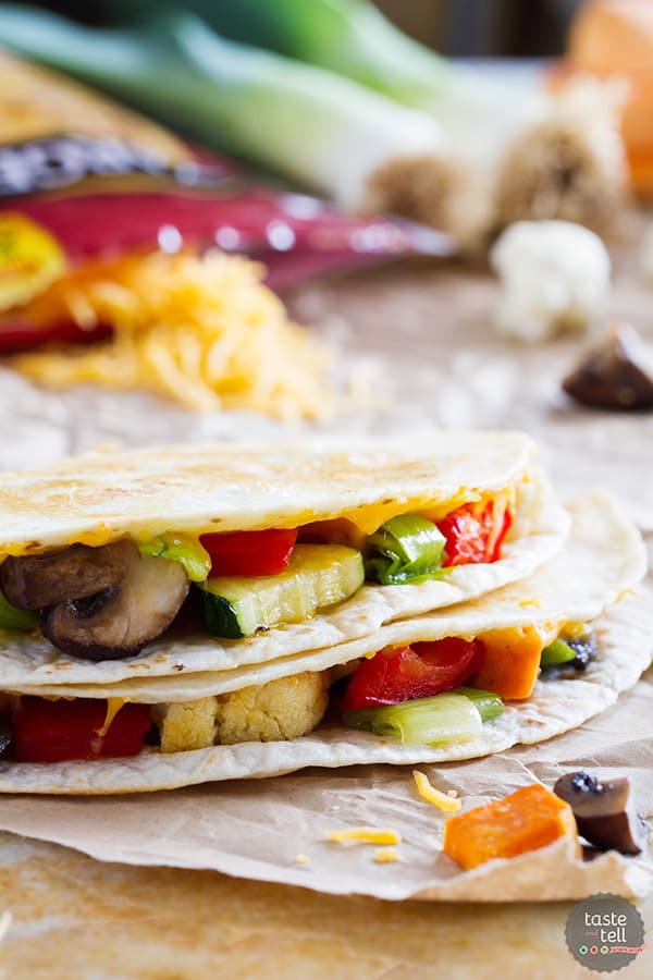 A great way to get your veggies in, these Roasted Veggie Quesadillas are a great way to clean out the veggie drawer to make a lunch or dinner that won’t leave you missing the meat!