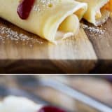 These Monte Cristo Crepes are sweet and savory and perfect for breakfast, brunch or dinner! Tender crepes are filled with cheese, ham and turkey and topped with raspberry jam and powdered sugar.