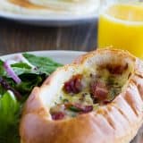 Perfect for breakfast or brunch, these Baked Egg, Bacon and Cheese Boats are a cinch to throw together and are filling and delicious.