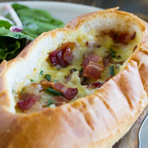 Perfect for breakfast or brunch, these Baked Egg, Bacon and Cheese Boats are a cinch to throw together and are filling and delicious.