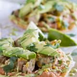 An easy Mexican dinner at home, these Chicken Tostadas with Poblano Cream Sauce have tons of flavor and are perfect for a weeknight. My family loved these!