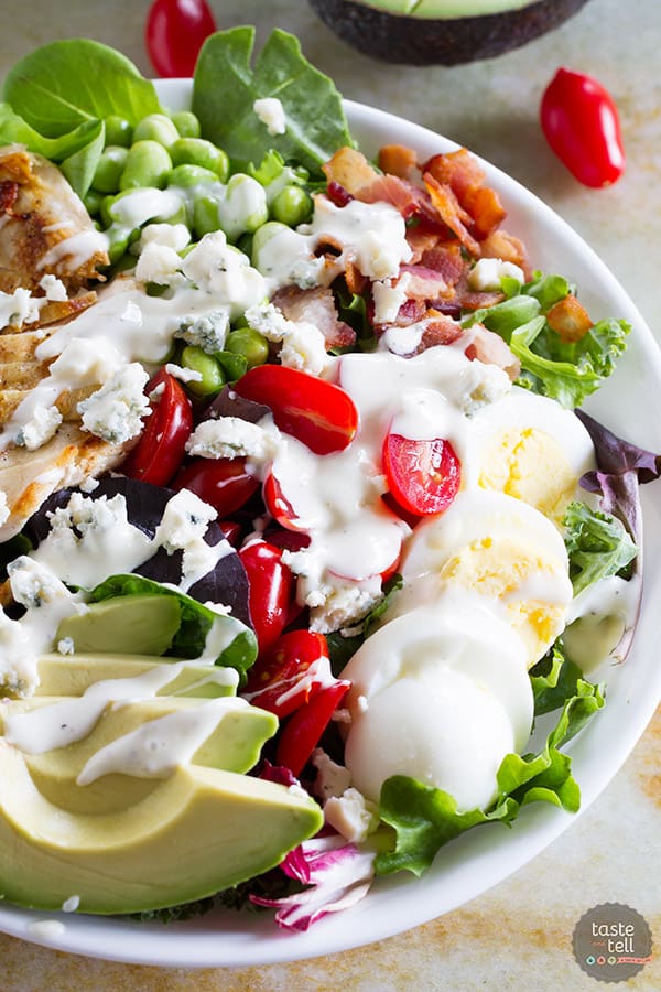 Looking to up your protein game? This Protein Packed Cobb Salad Recipe is not only delicious and filling, but filled with protein.