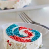 slice of 4th of July Cake Roll showing red and blue interior