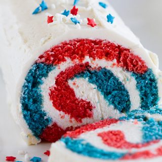 Show off your red white and blue with this festive 4th of July Cake Roll. Your guests will be amazed when you cut into it, revealing the patriotic colors.