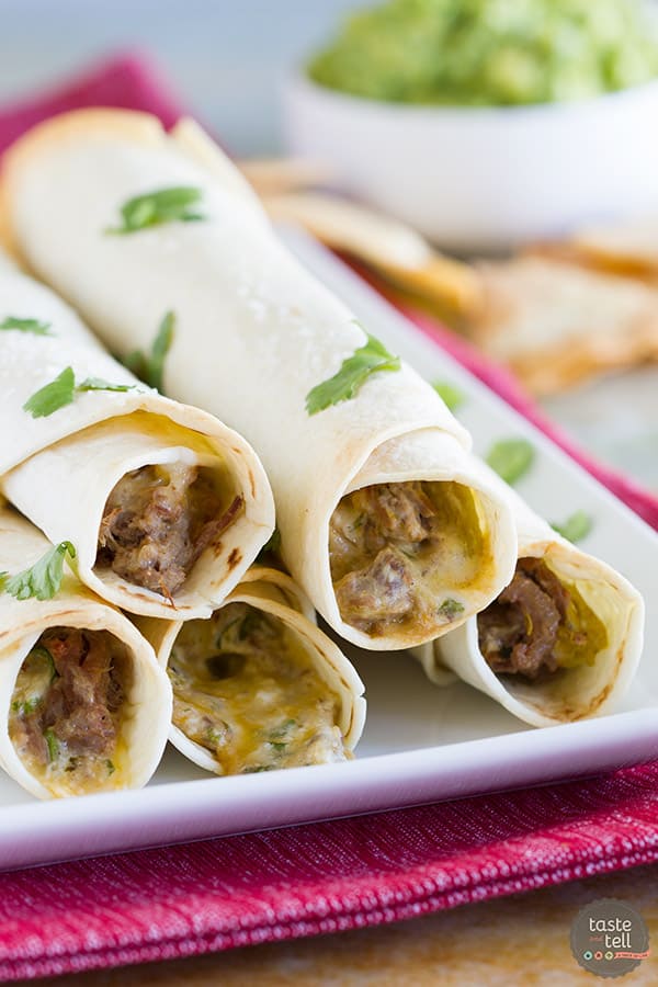 Forget the frying - these Mexican Shredded Beef Baked Taquitos are crisp and flavorful without the added calories. They freeze well, too!