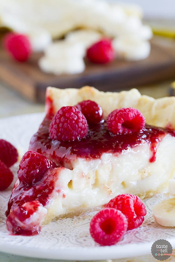 Banana cream pie meets raspberry goodness in this Raspberry Banana Pie recipe that is sweet and creamy and perfect. Who would have ever guessed that raspberry and banana were such a perfect match?