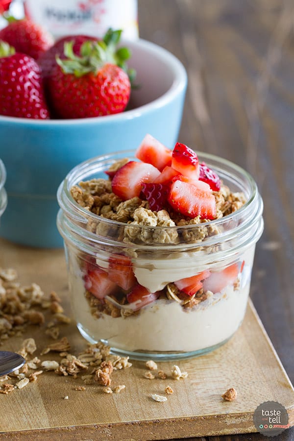 Peanut Butter and Jelly Yogurt Parfait Recipe topped with strawberries.