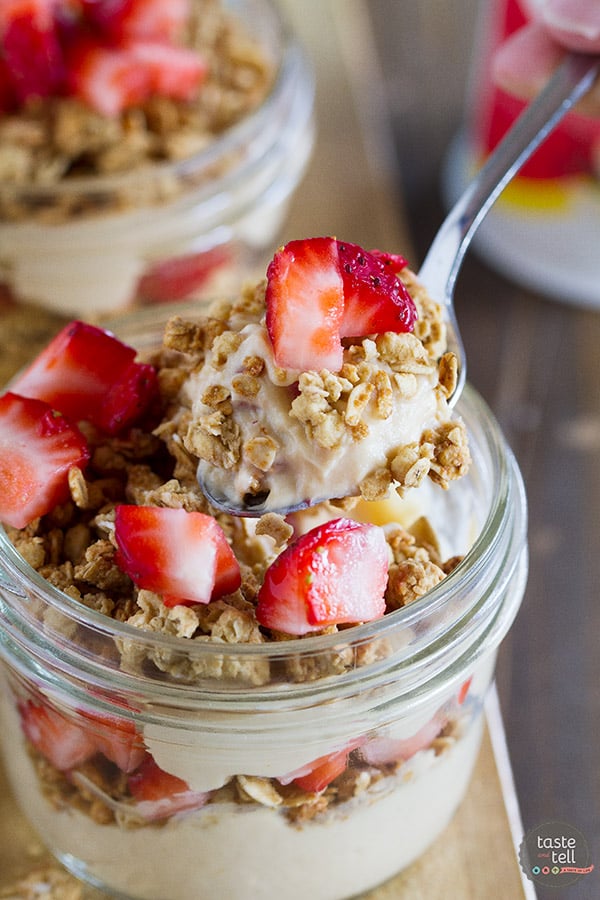 Peanut butter and jelly yogurt parfait topped with granola.