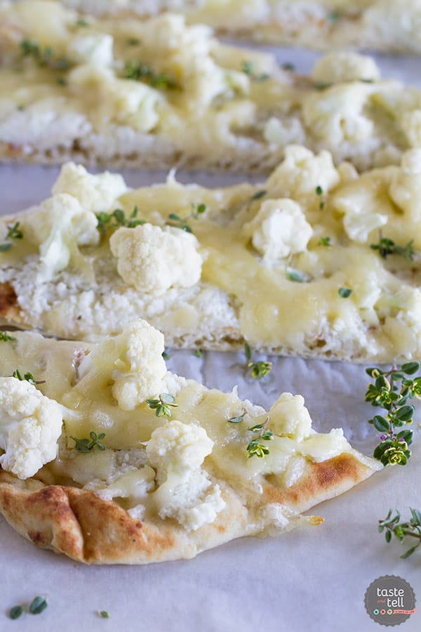 Perfect for an easy, vegetarian lunch, this Easy Flatbread Recipe with Cauliflower and Gruyere only takes minutes to make and is filling and full of flavor.