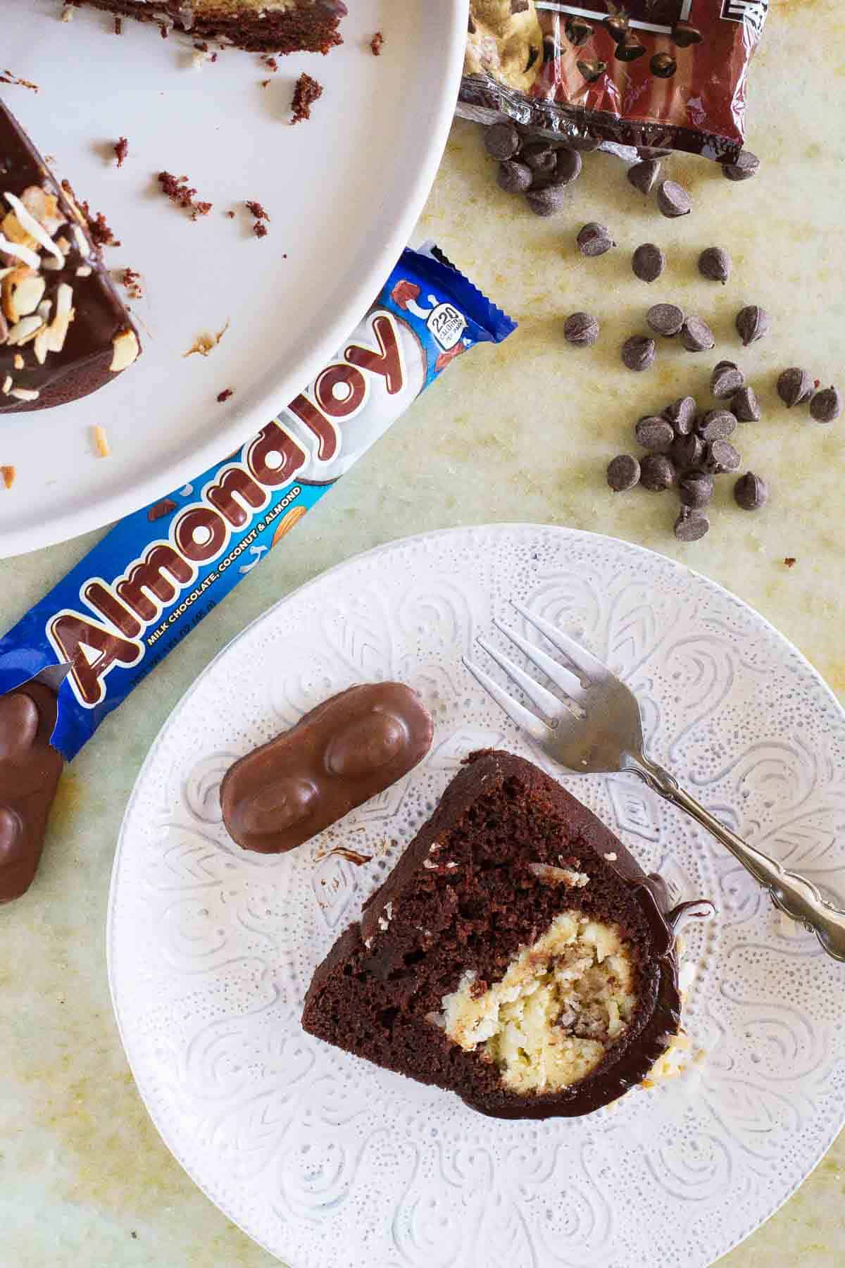 overhead view of a slice of Almond Joy Candy Bar Filled Bundt Cake on a plate