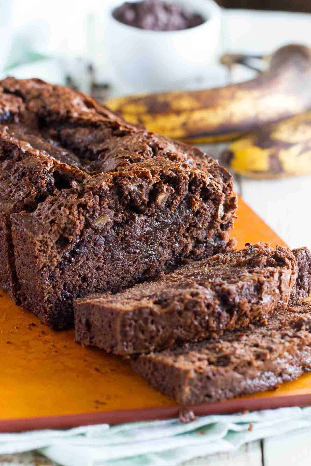 loaf of brownie mix banana bread on a cutting board